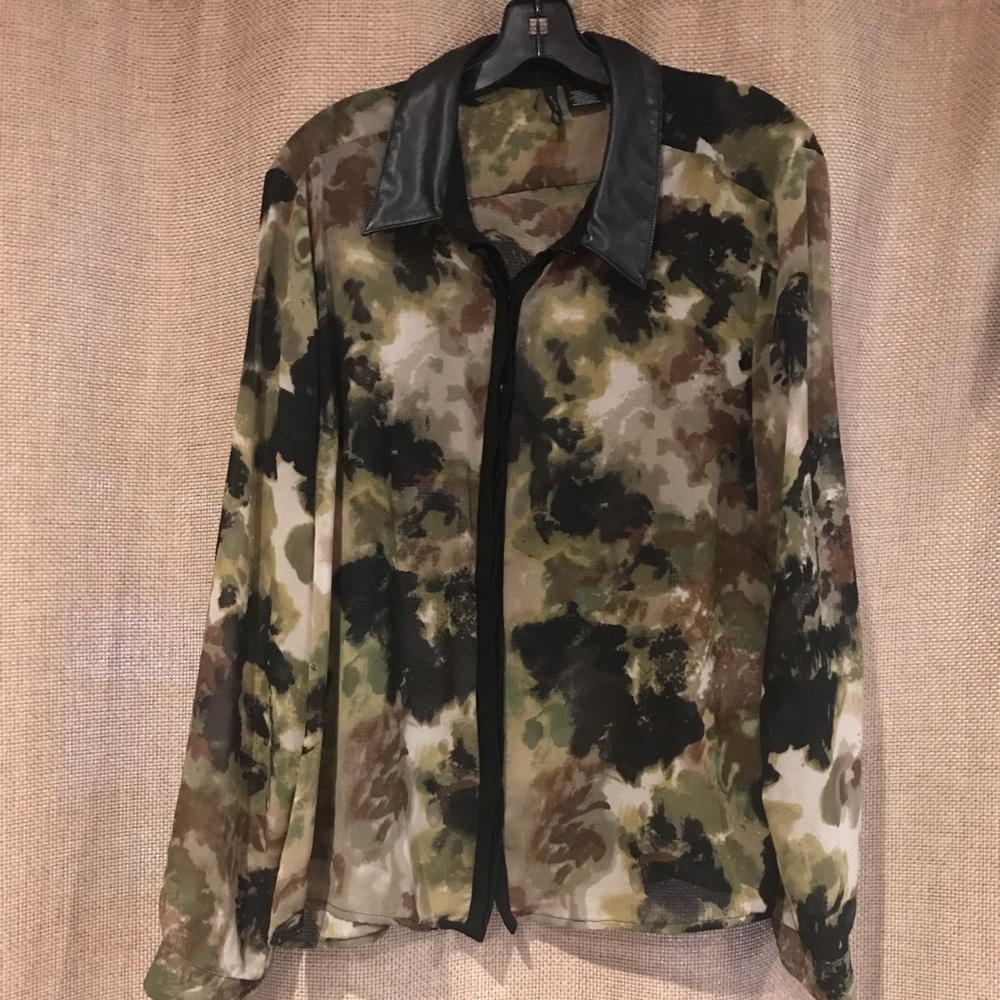 Long sleeve top. Sheer.